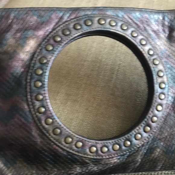 Brass/DK gold colored fold over evening bag.